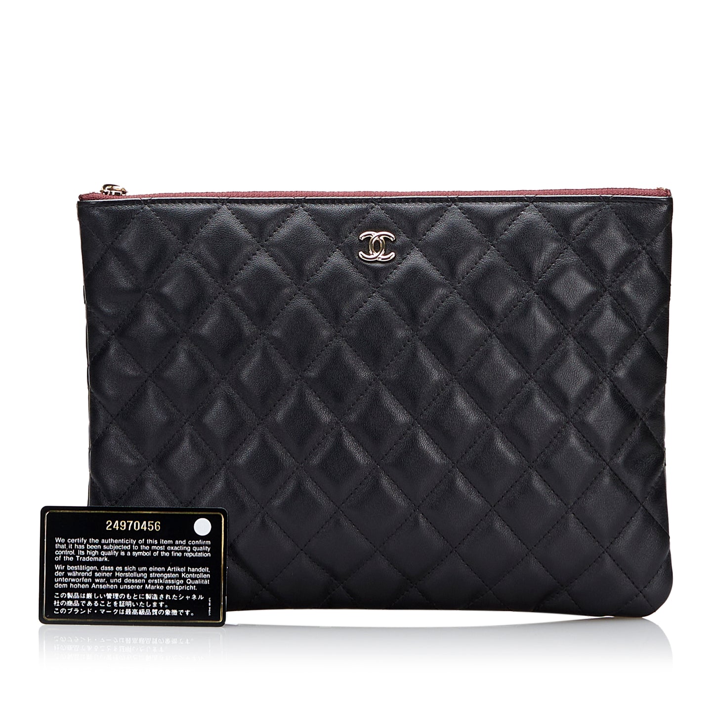 Quilted O Case Clutch Bag